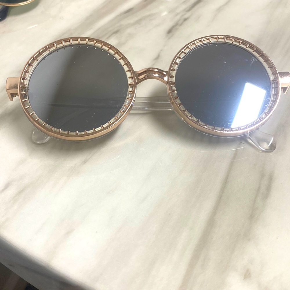 Hippie sunglasses with a slight scratch in corner